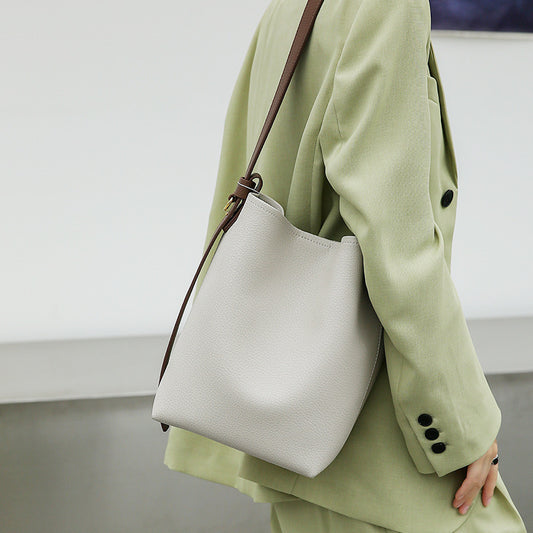 Ivory white cowhide leather crossbody bucket bag front view