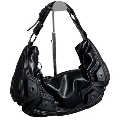 Side profile of crescent PU leather bag in retro style