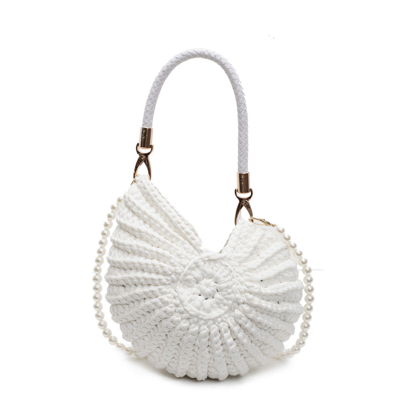 Backside of handmade woven fabric tote bag with two shoulder straps