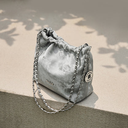 Fall/winter fashion outfit with cowhide chain purse