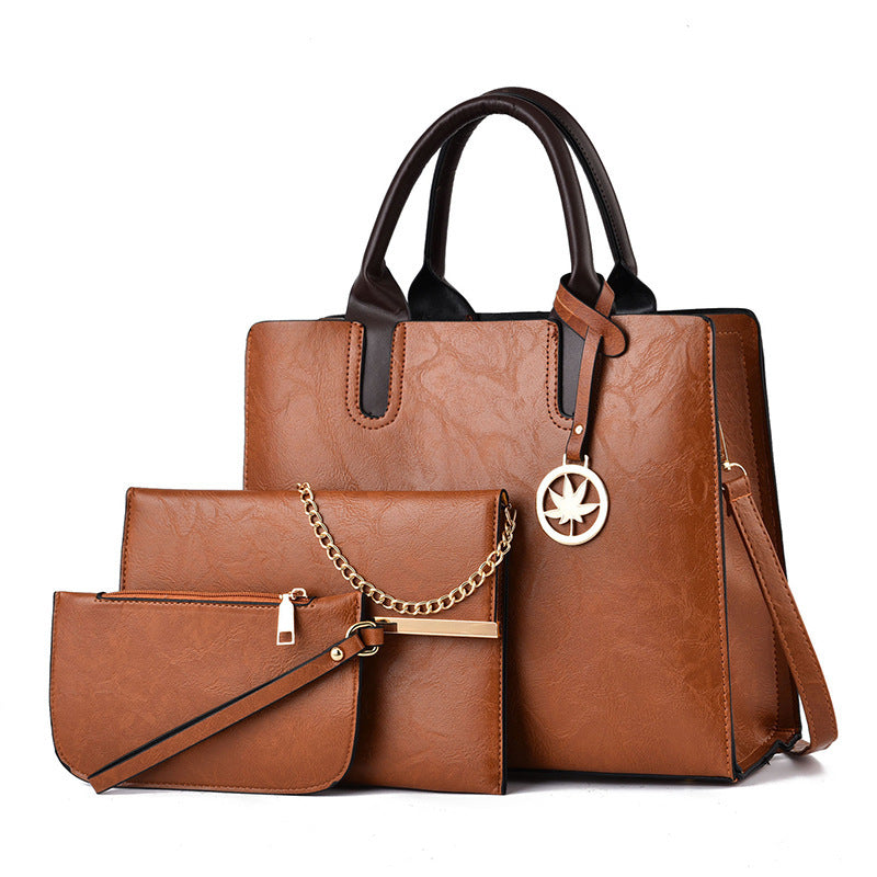 Brown handbag with matching pouch
