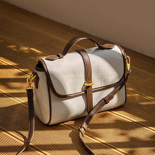 Front view of brown genuine leather crossbody messenger bag
