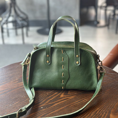 Green cowhide shoulder bag in retro style with 3D outer pocket