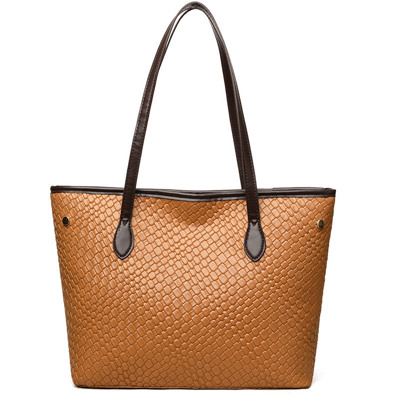 Inside view of women’s PU leather commuter bag with zipper change pocket