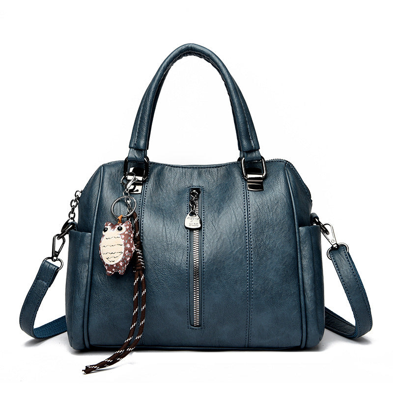 Side view of horizontal square PU handbag