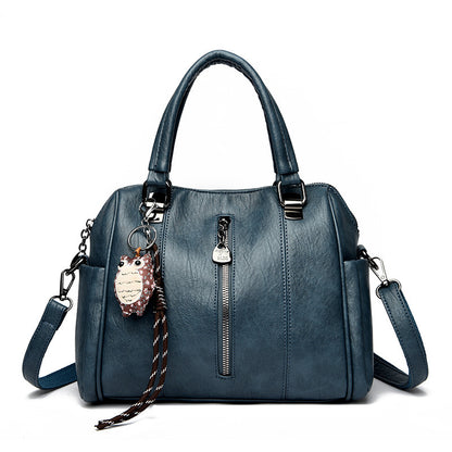 Side view of horizontal square PU handbag