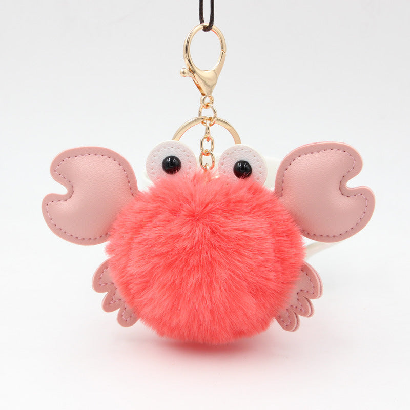 ink crab-shaped keychain with a fluffy body 