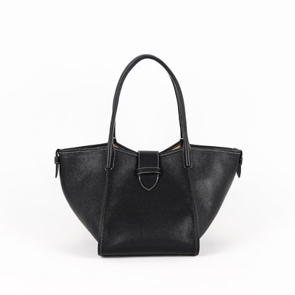 Black cowhide leather dumpling handbag with magnetic closure