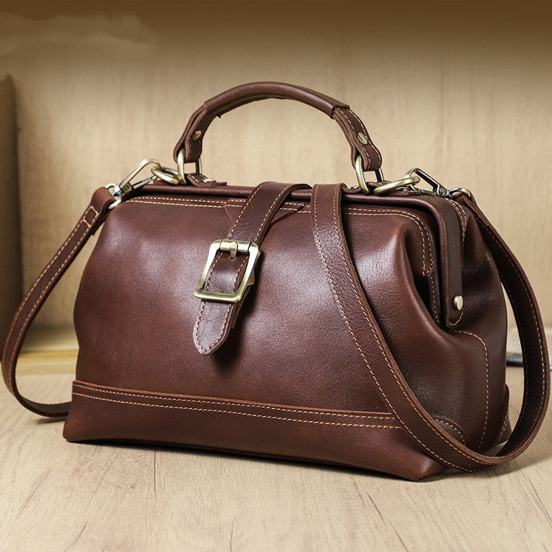 Interior compartments of large capacity cowhide leather shoulder bag