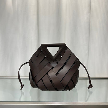 Interior of woven leather triangle bucket handbag