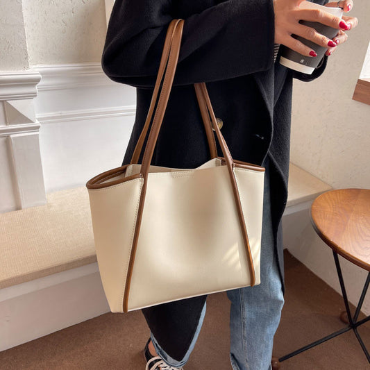 Light brown PU leather shoulder bag styled with neutral outfit