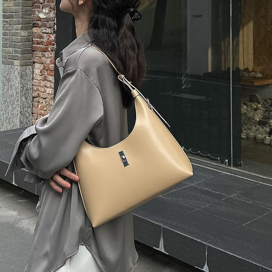 Black cowhide leather dumpling-shaped crossbody bag for women