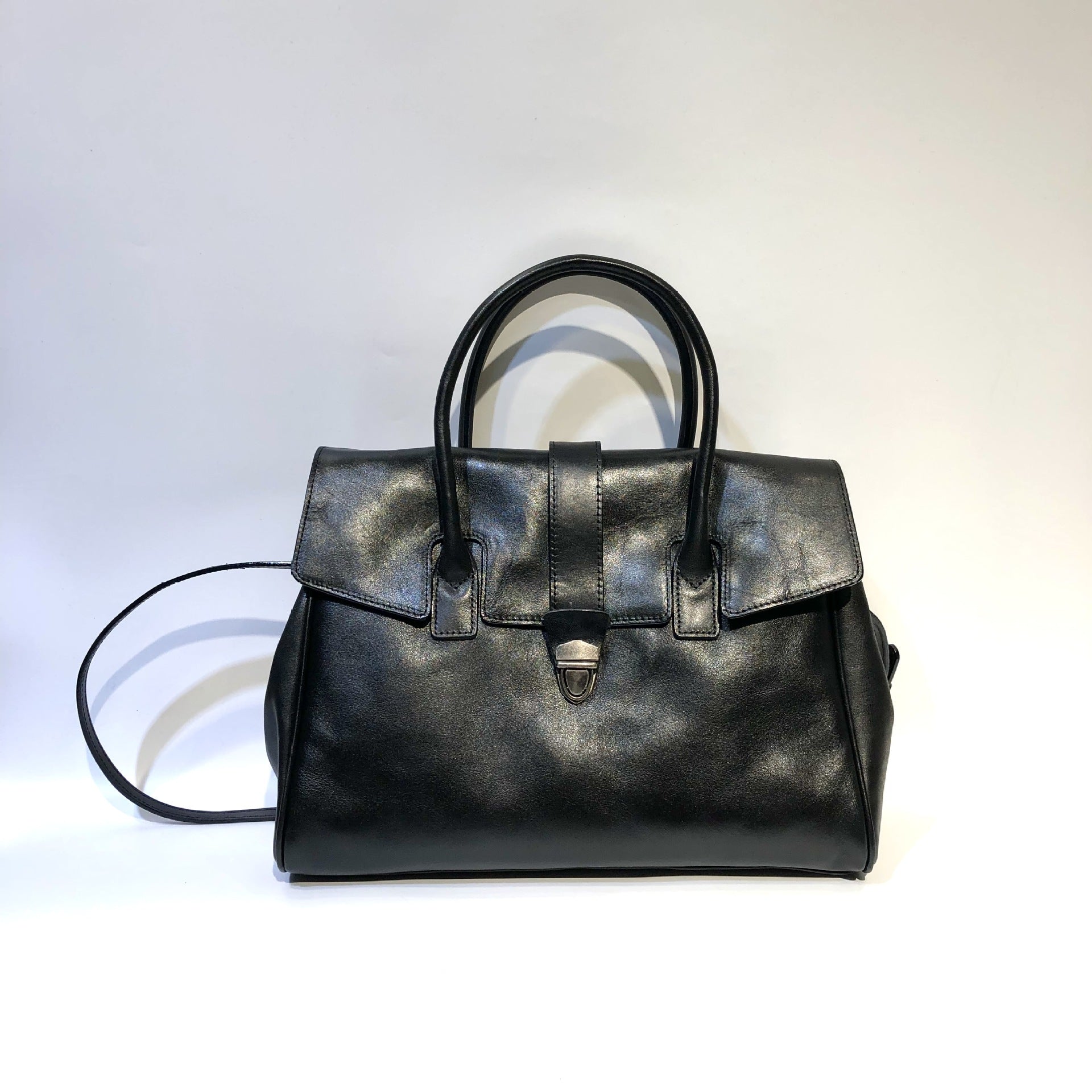 black handmade leather tote with zip compartment