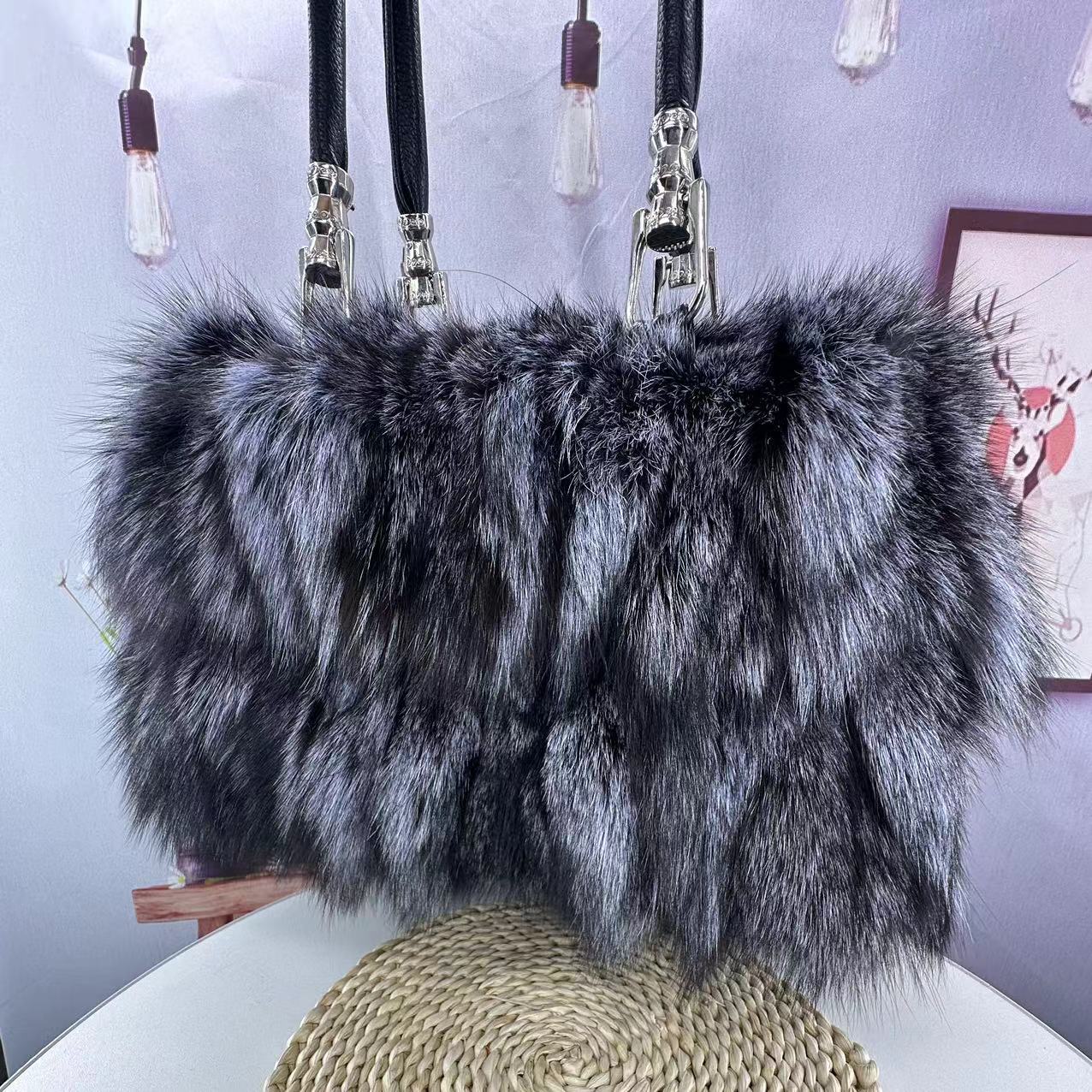 Blue fox fur handbag with leather accents
