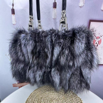 Blue fox fur handbag with leather accents