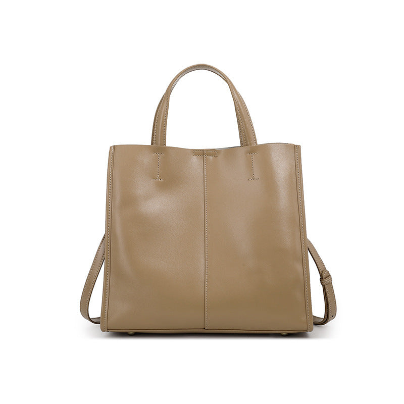Dual shoulder strap design on cowhide leather tote