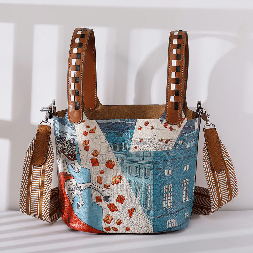 Front view of painted leather vegetable-style bucket bag
