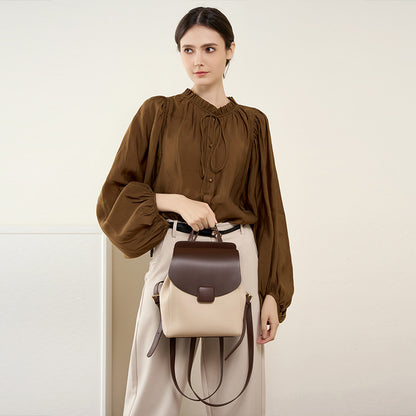 Interior view showing large capacity of small leather backpack