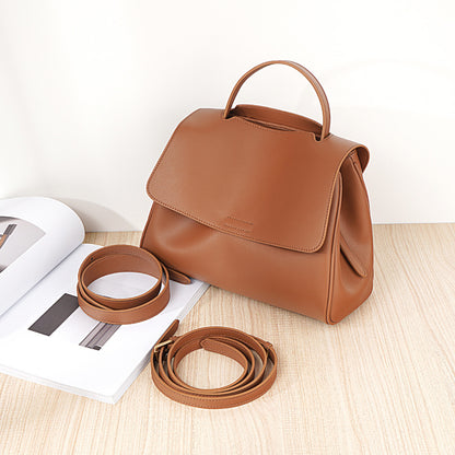 Inside view of soft leather bag with zipper compartments