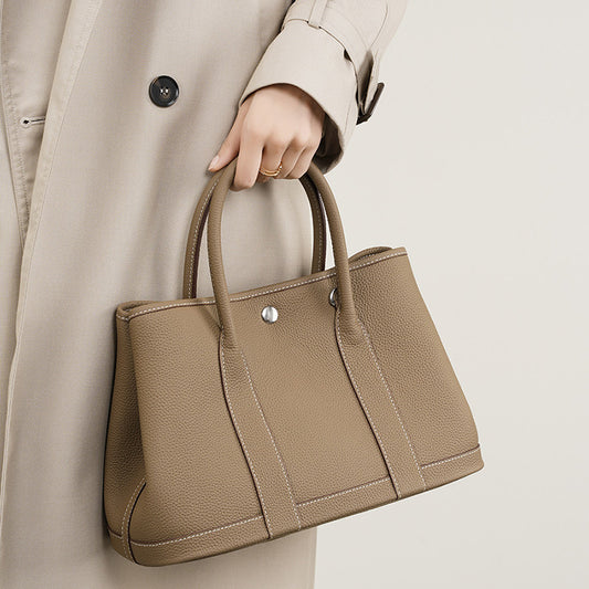 Genuine leather shopping bucket bag with cowhide lining