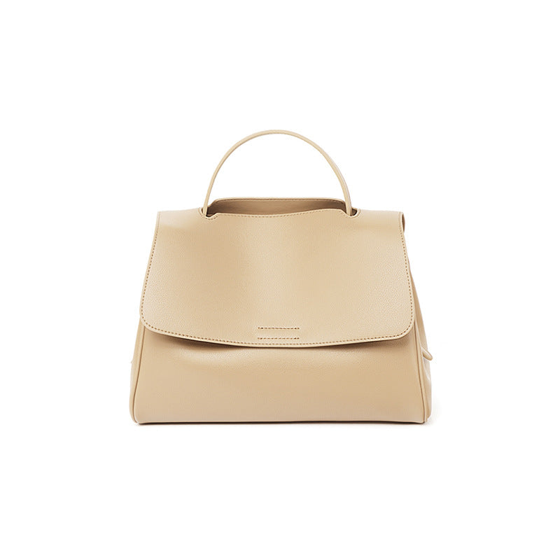Side view of soft horizontal square leather messenger purse
