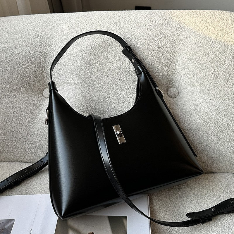 Side view of soft cowhide dumpling crossbody bag
