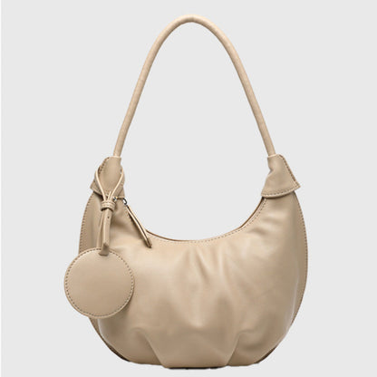 Side view of soft PU leather dumpling shoulder purse