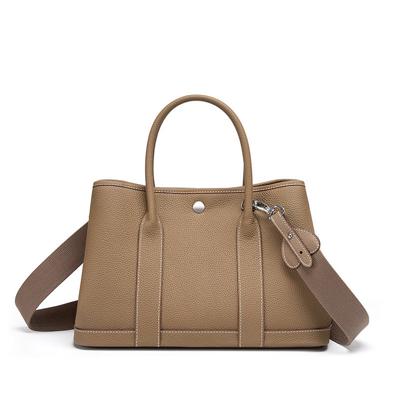 Structured square bucket bag in genuine cowhide