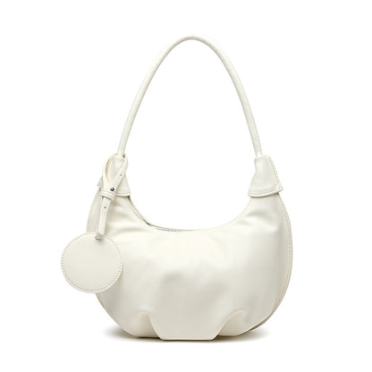 White PU leather dumpling purse with soft structure