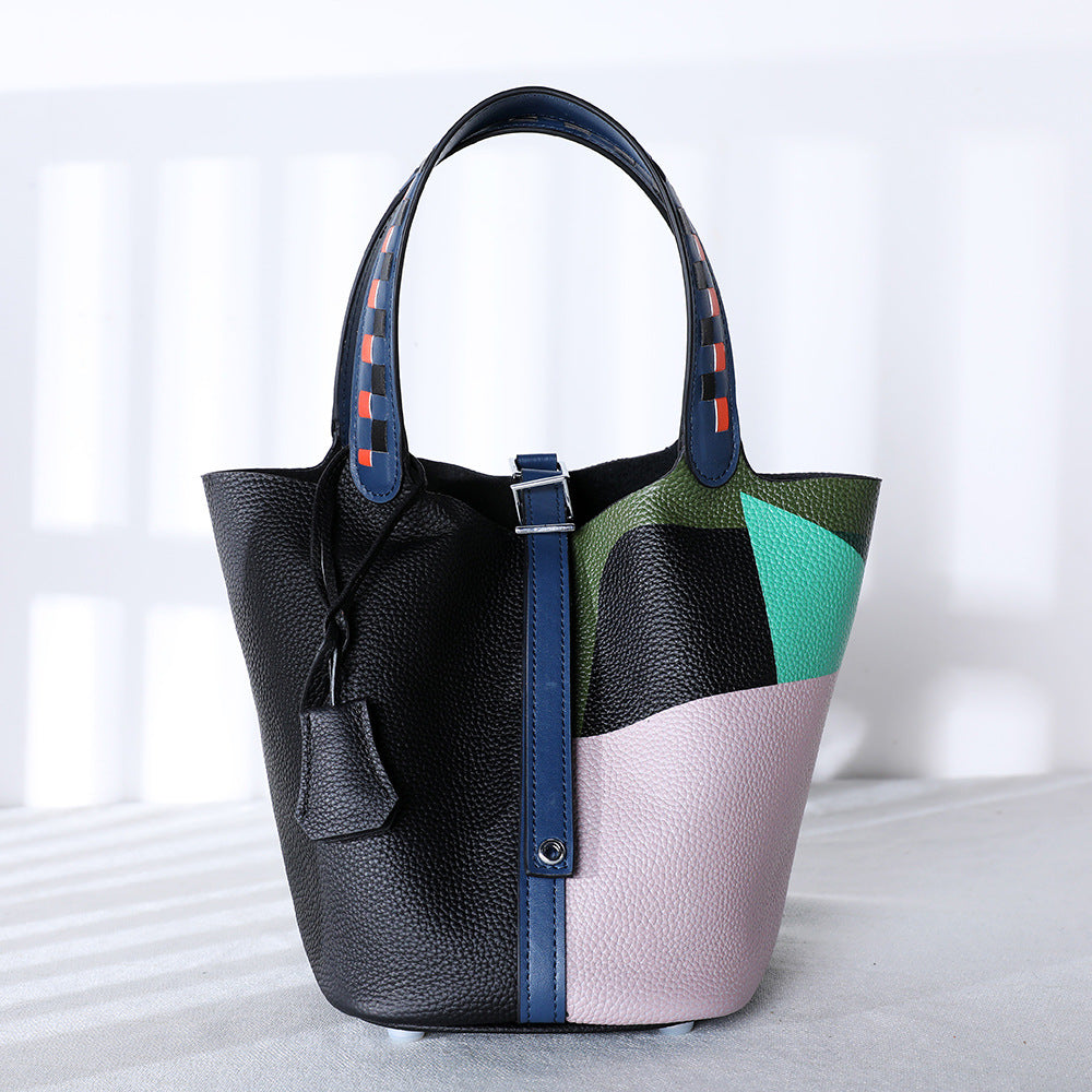 White and yellow painted leather bucket bag with open top
