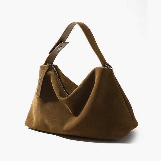 Brown handbag on a white background