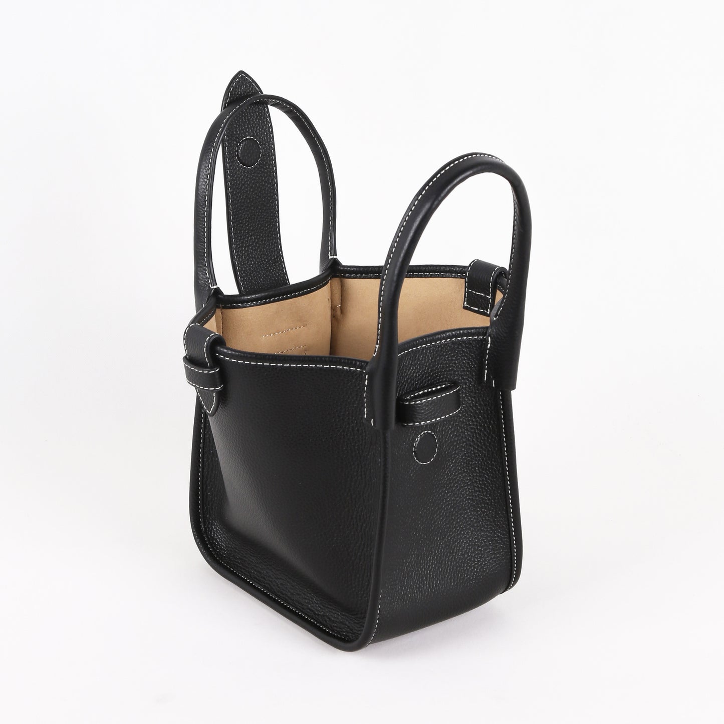 Size comparison of small and large cowhide dumpling tote bags