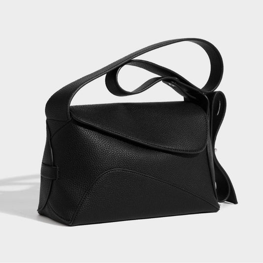 Front view of minimalist cowhide leather shoulder tote for women