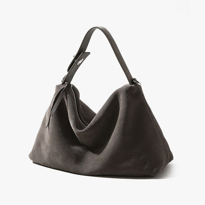 Dark gray handbag with a subtle texture