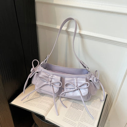 Assorted colors of pleated PU leather handbags with tassel and bow
