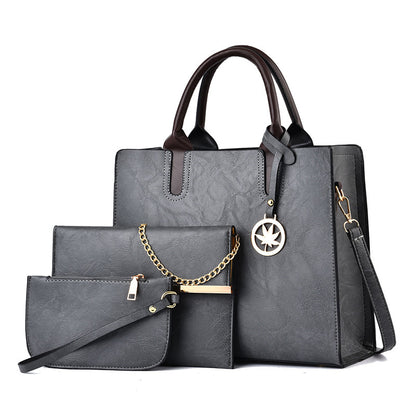 Front view of large PU leather messenger tote for women