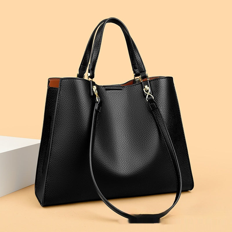 Black PU leather women's fashion tote bag front view