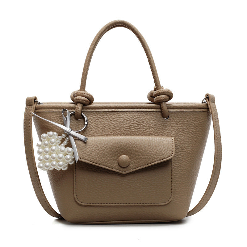 Side profile of Korean crossbody shoulder bag in PU leather