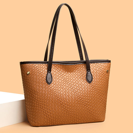 Front view of retro-style PU leather large capacity commuter handbag for women