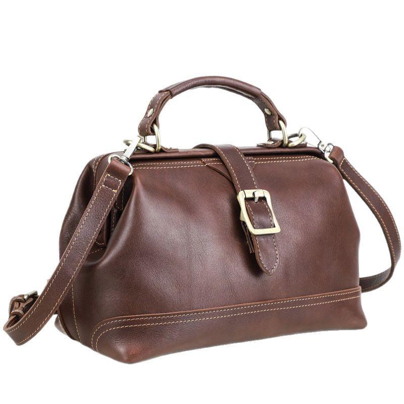 Side profile of reddish brown cowhide shoulder messenger bag