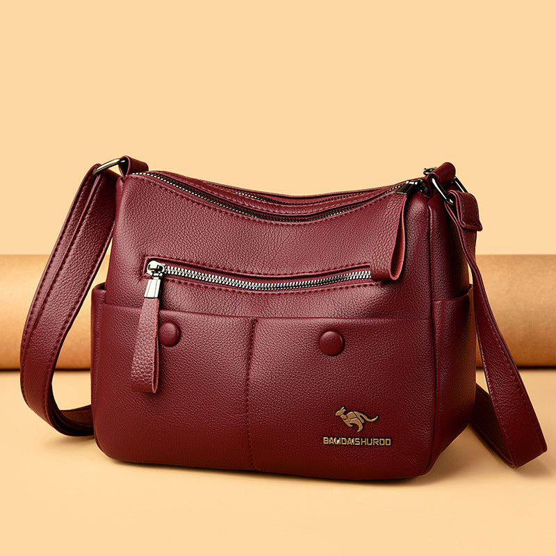 Front view of soft PU leather shoulder bag in black for women