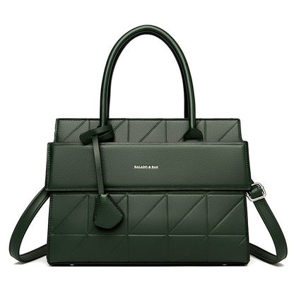 Side profile of women’s large tote handbag