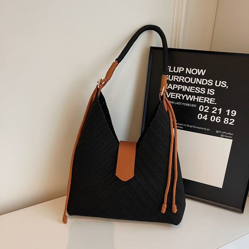 Underarm shoulder bag in black nylon with soft structure