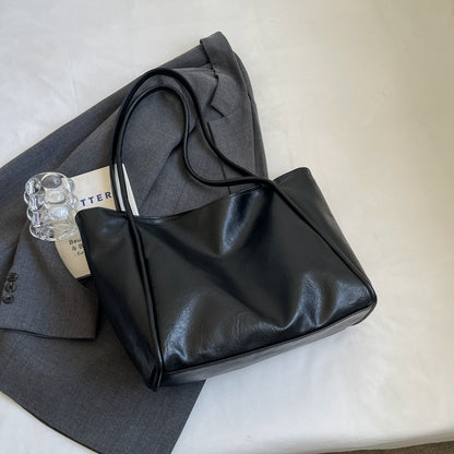 Soft PU leather travel totes shown in four urban colors