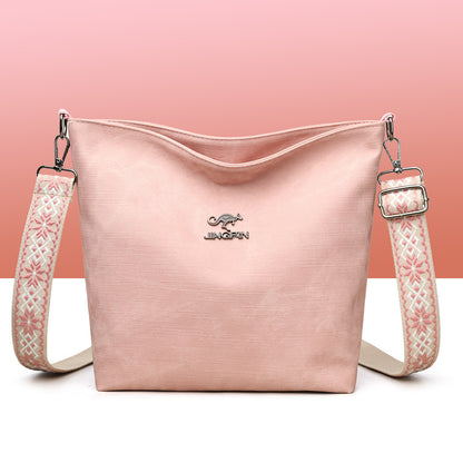 Close-up of stitching on soft PU leather shoulder crossbody bag