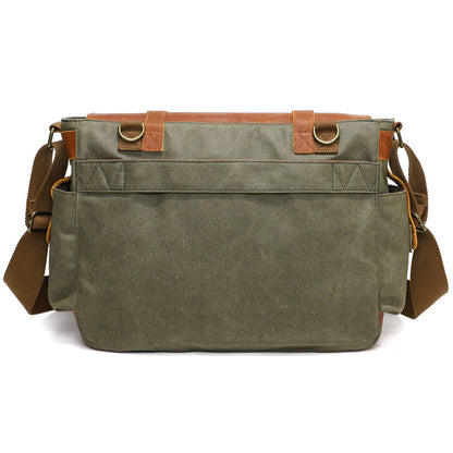 Gray waxed canvas crossbody bag with leather-trimmed back pocket