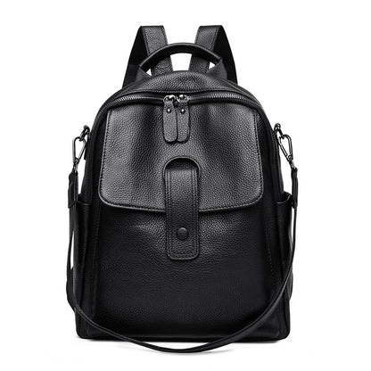 Stylish leather backpack worn by a woman outdoors