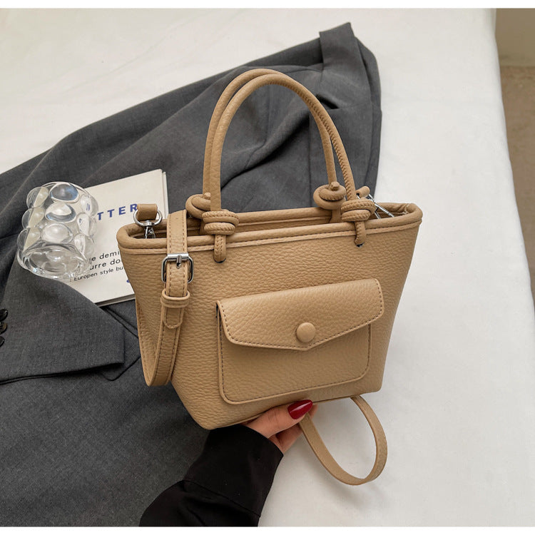 Inside view of Korean PU leather bag with zippered compartments